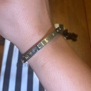 Henri Bendel Petite Bangle / Bracelet with Clasp in Silver with Gold Accent